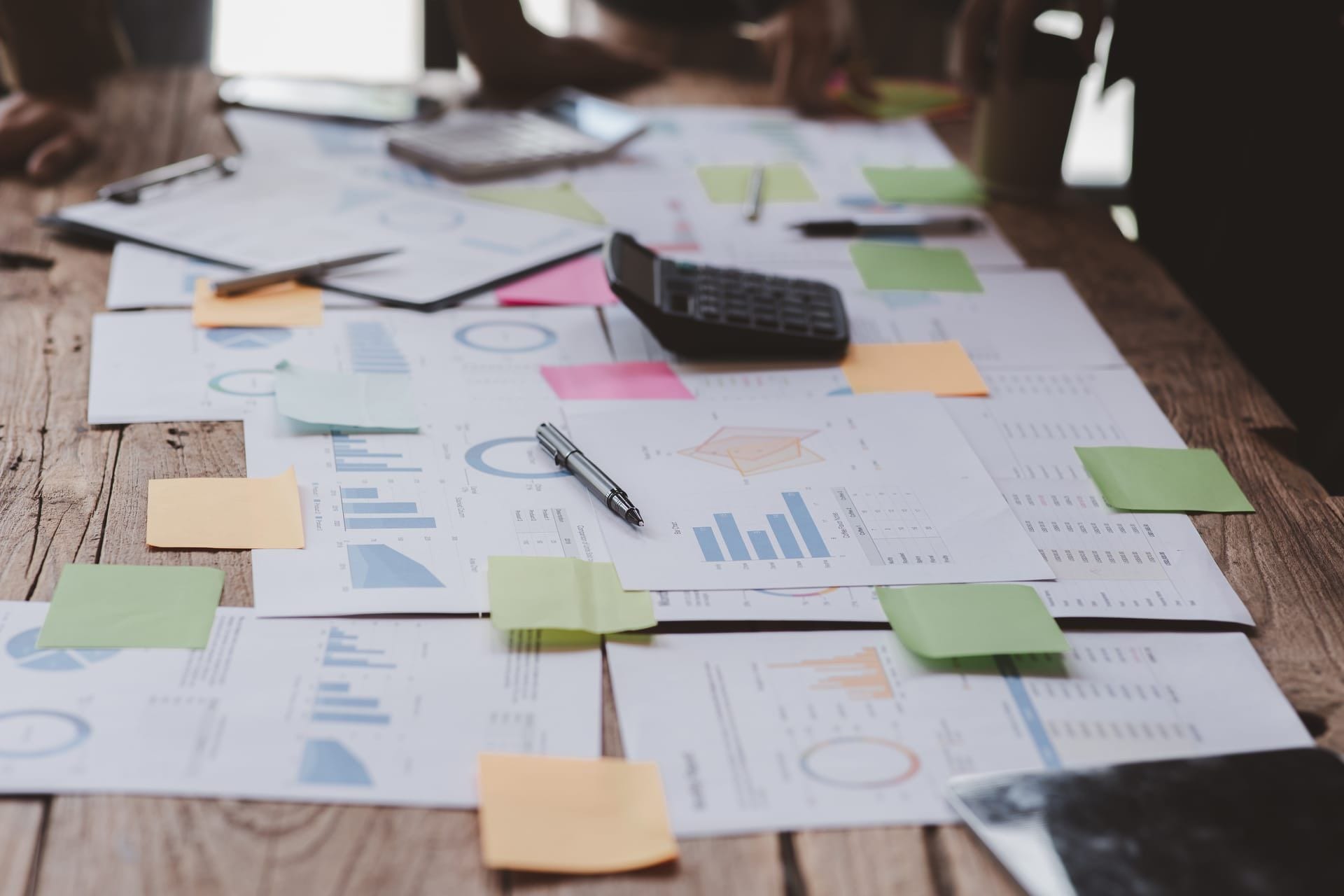 Consultants reviewing merchant services data