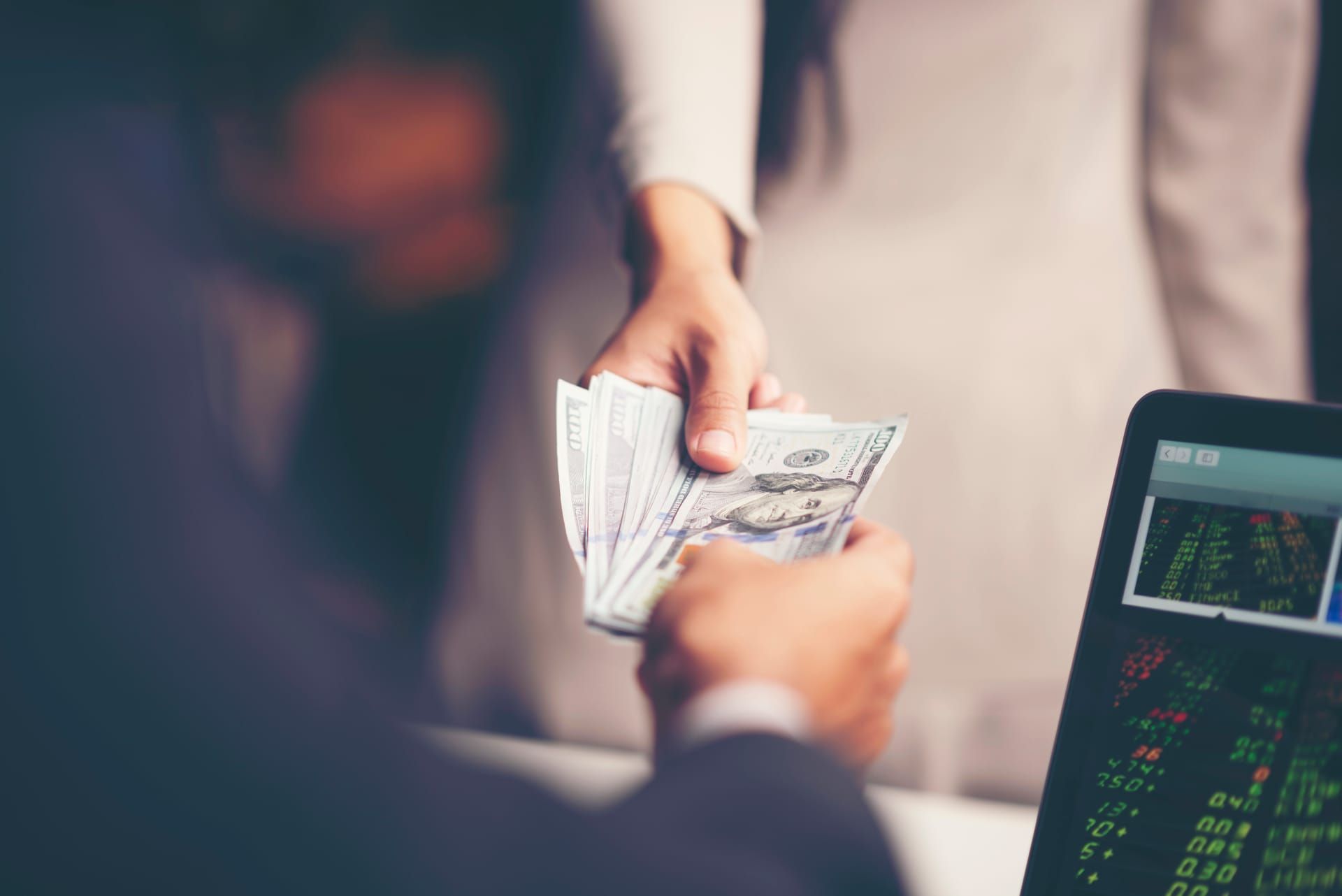 Banking executives discussing commercial deposit strategy